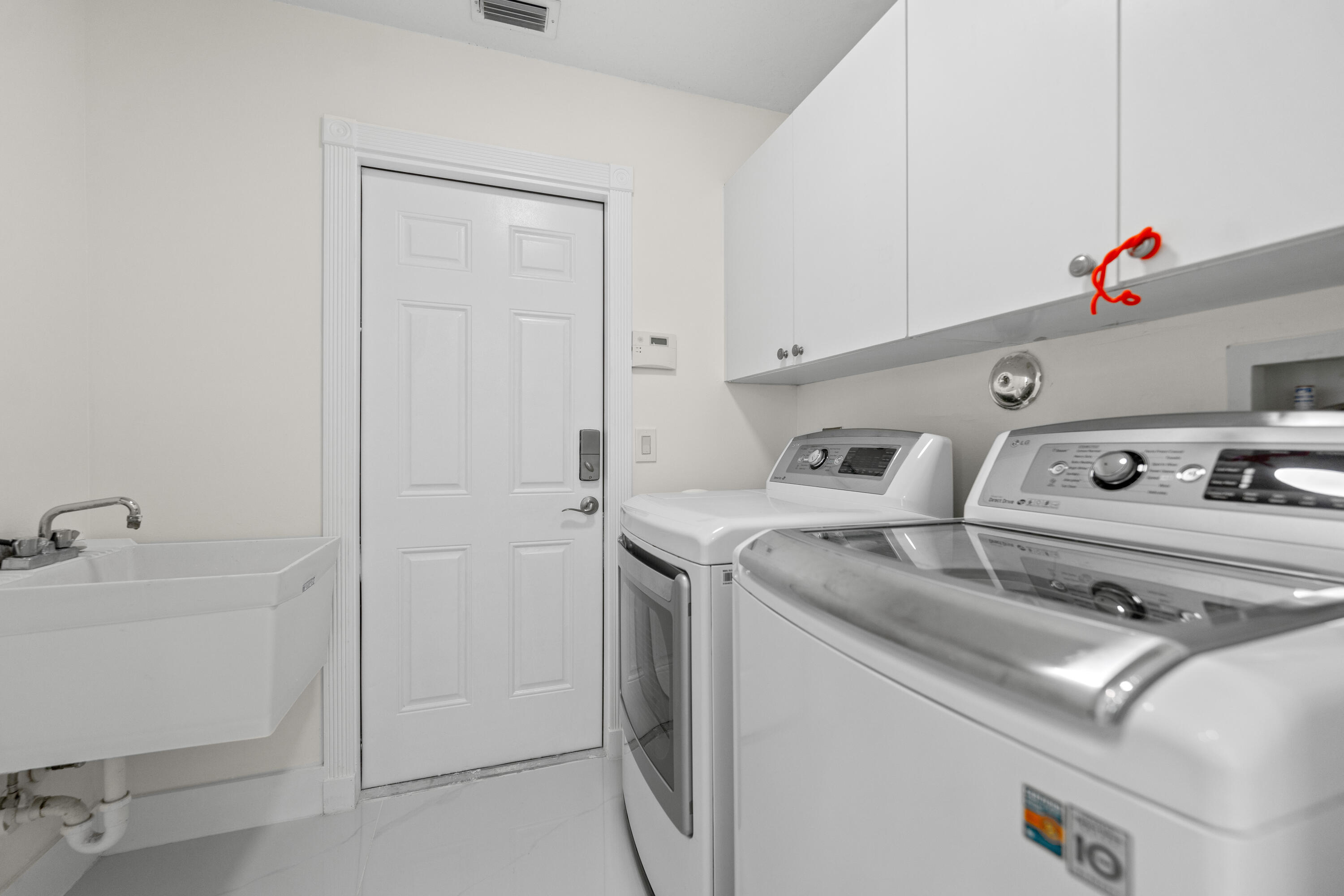 10648 Maple Chase Drive Boca Raton, FL 33498 - Photo 30 of 51 Laundry Room