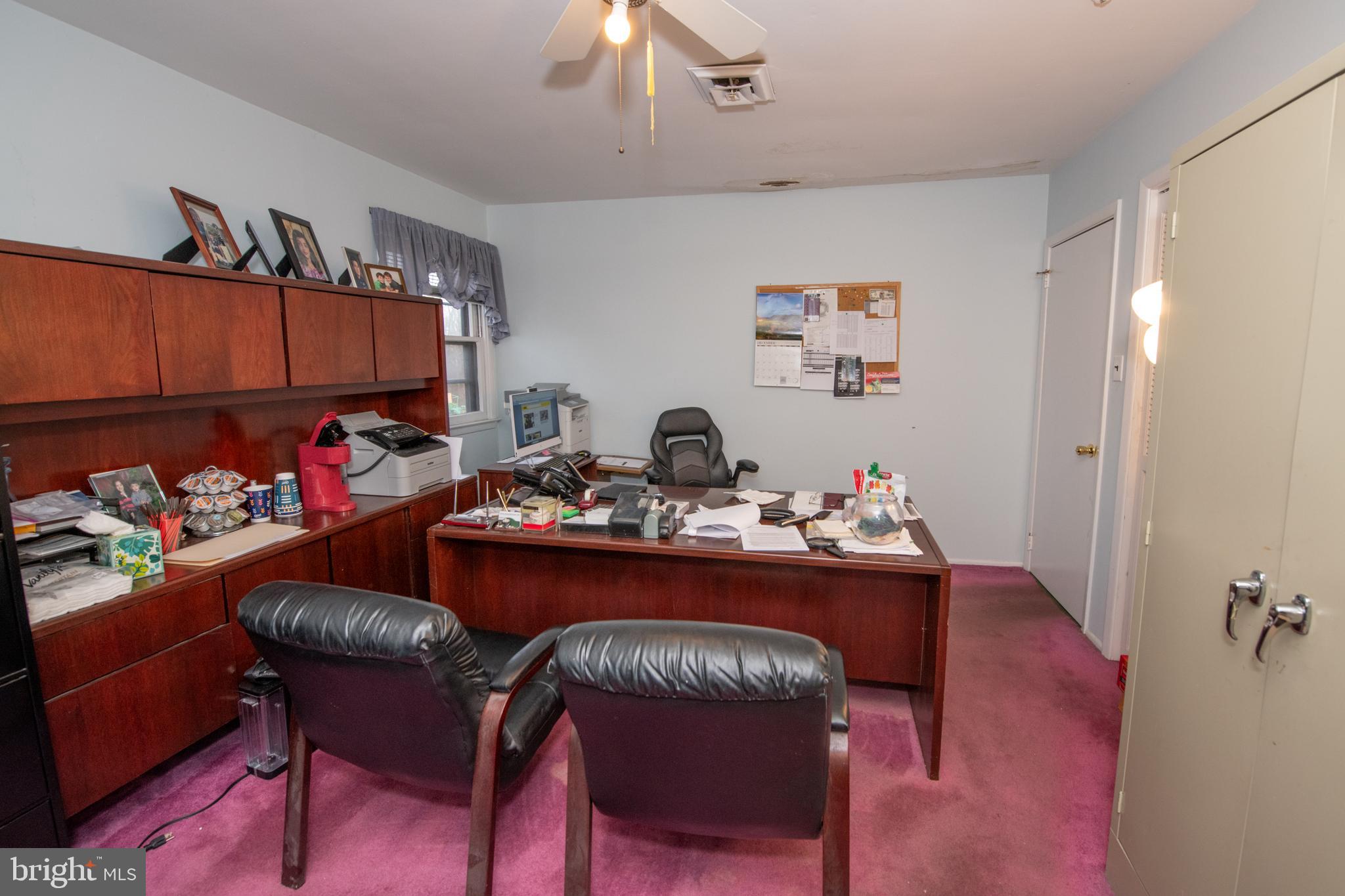 1210 Mettler Road Huntingdon Valley, PA 19006 - Photo 13 of 24 a living room with furniture and a chair