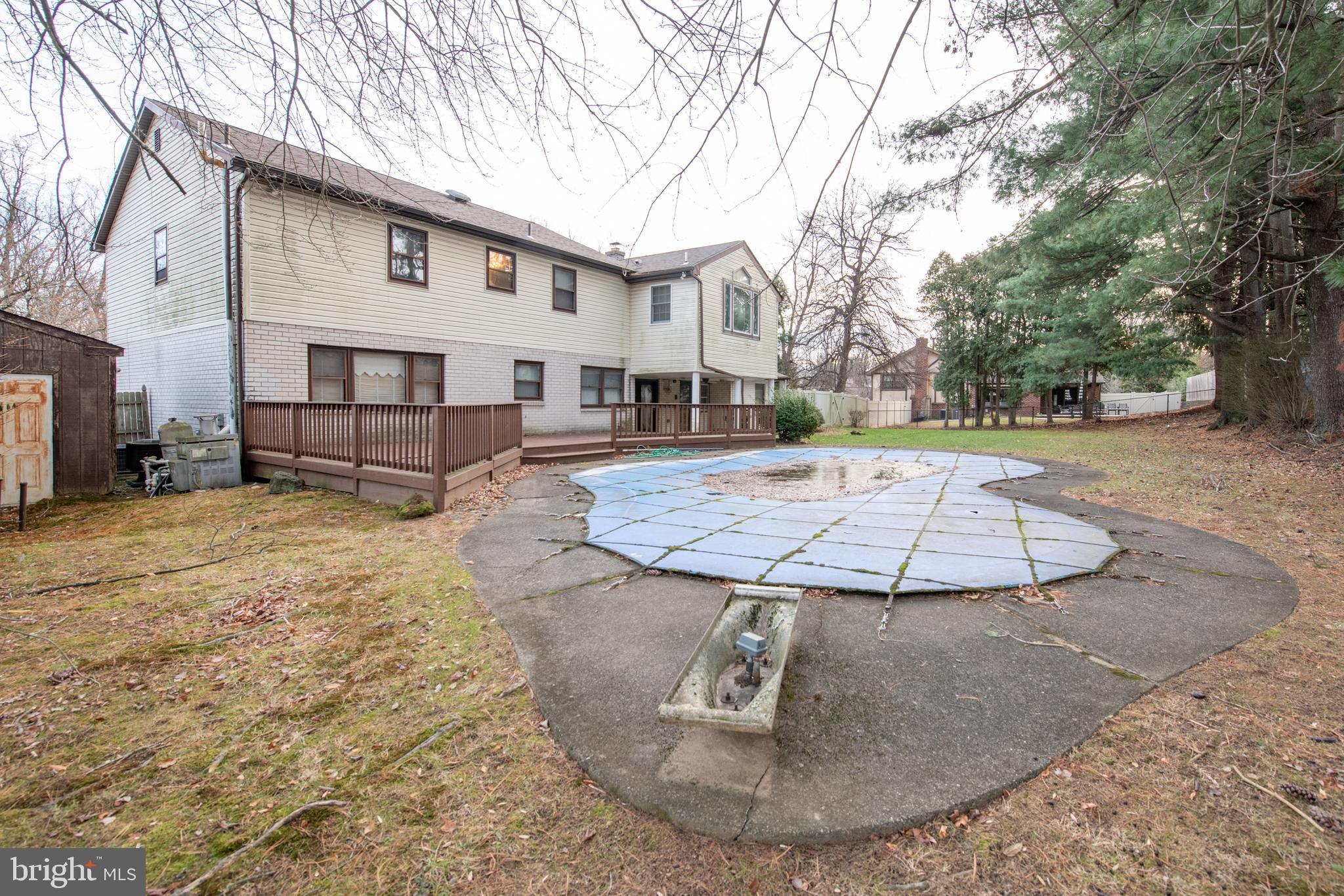 1210 Mettler Road Huntingdon Valley, PA 19006 - Photo 21 of 24 a view of a white house with a yard