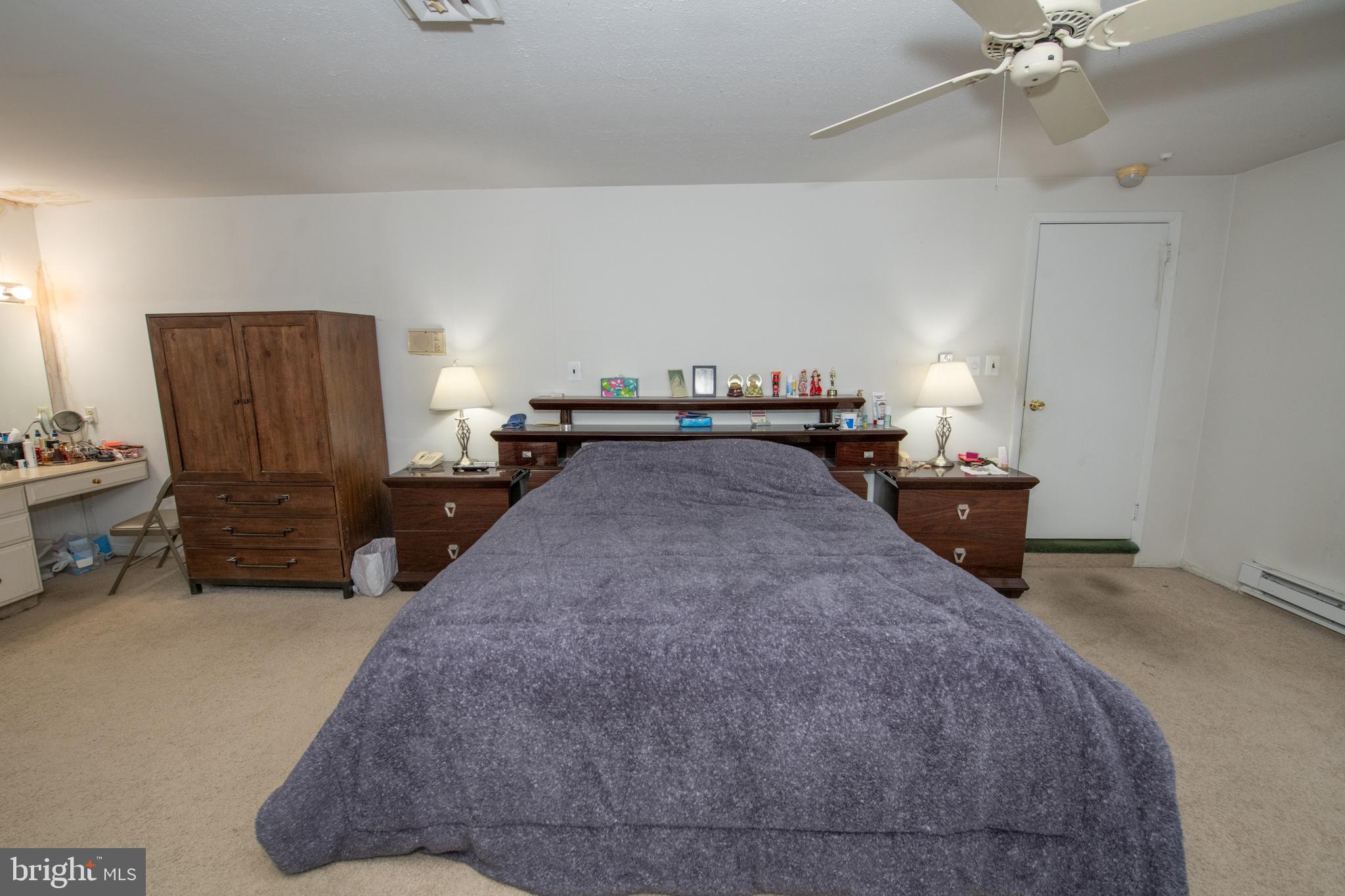 1210 Mettler Road Huntingdon Valley, PA 19006 - Photo 10 of 24 a bed room with a bed and a television