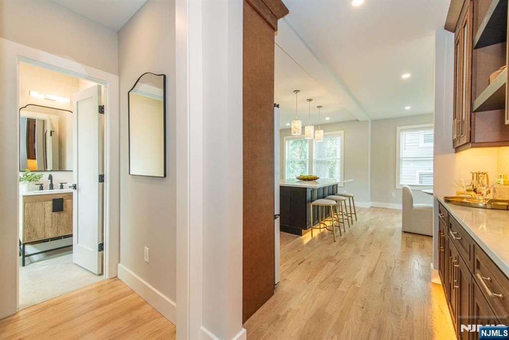 43 Alexander Avenue Montclair, NJ 07043 - Photo 17 of 50 a view of a kitchen and dining room with wooden floor