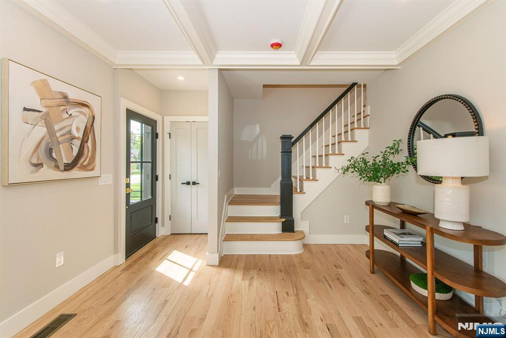 43 Alexander Avenue Montclair, NJ 07043 - Photo 19 of 50 a view of entryway and hall with wooden floor