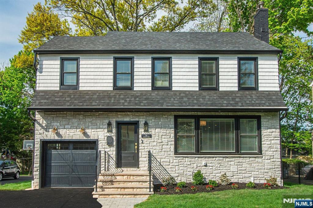 43 Alexander Avenue Montclair, NJ 07043 - Photo 2 of 50 a front view of a house with garden