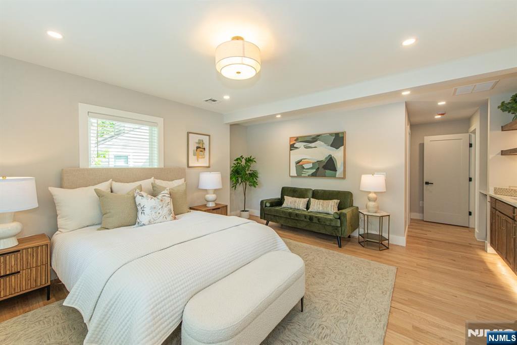 43 Alexander Avenue Montclair, NJ 07043 - Photo 22 of 50 a bedroom with a bed and a couch