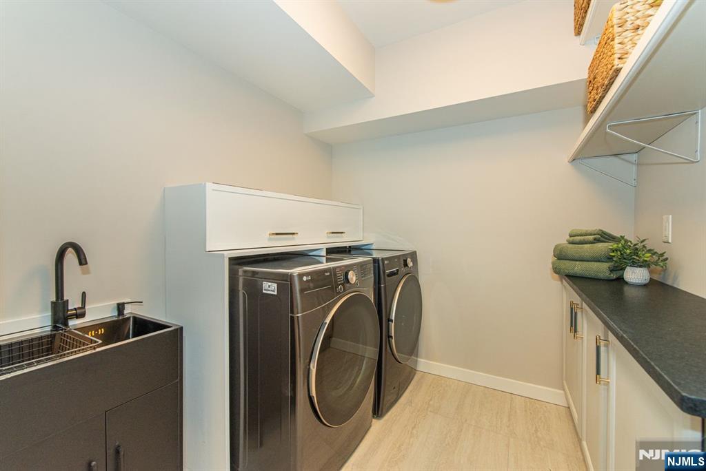 43 Alexander Avenue Montclair, NJ 07043 - Photo 43 of 50 a utility room with dryer and washer