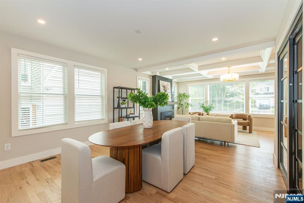 43 Alexander Avenue Montclair, NJ 07043 - Photo 8 of 50 a dining room with furniture window and wooden floor