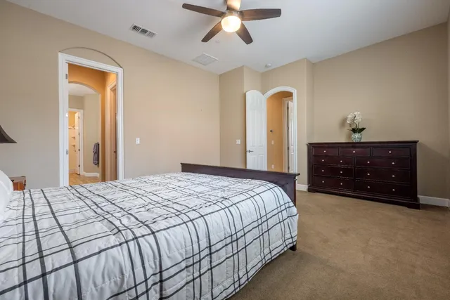 a view of an outdoor sitting area with furniture