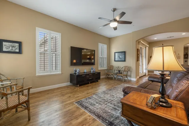 a living room with furniture and a rug
