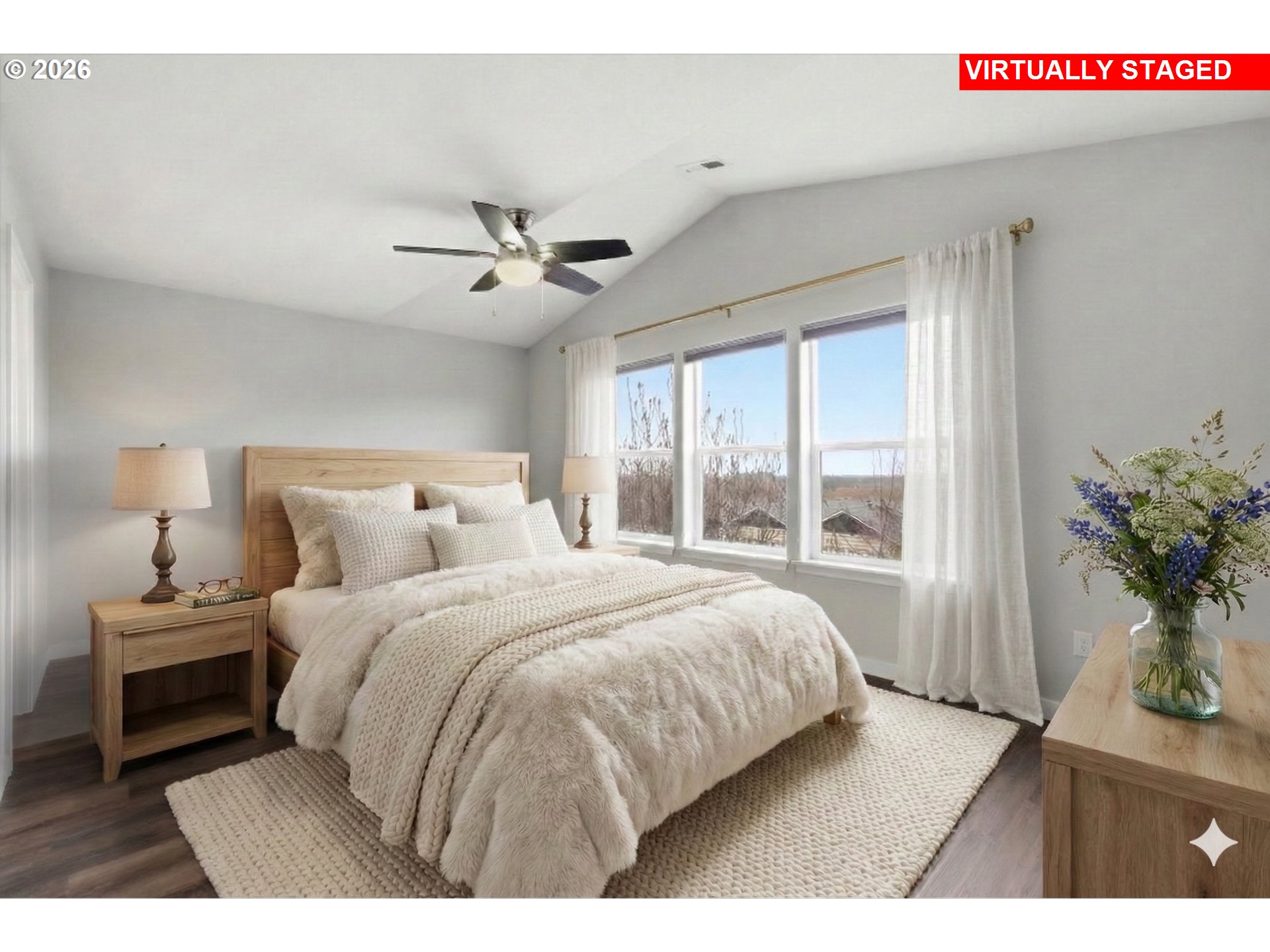 3130 Northwest Pacific Rim Drive Camas, WA 98607 - Photo 13 of 33 a bedroom with a large bed and a window