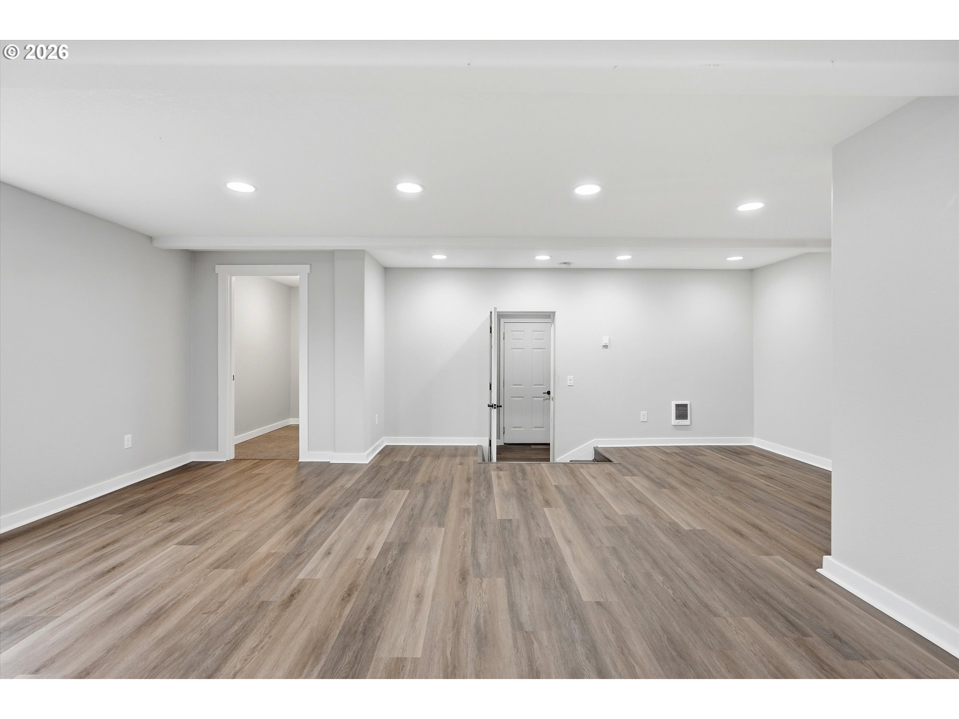 3130 Northwest Pacific Rim Drive Camas, WA 98607 - Photo 23 of 33 a view of an empty room with wooden floor