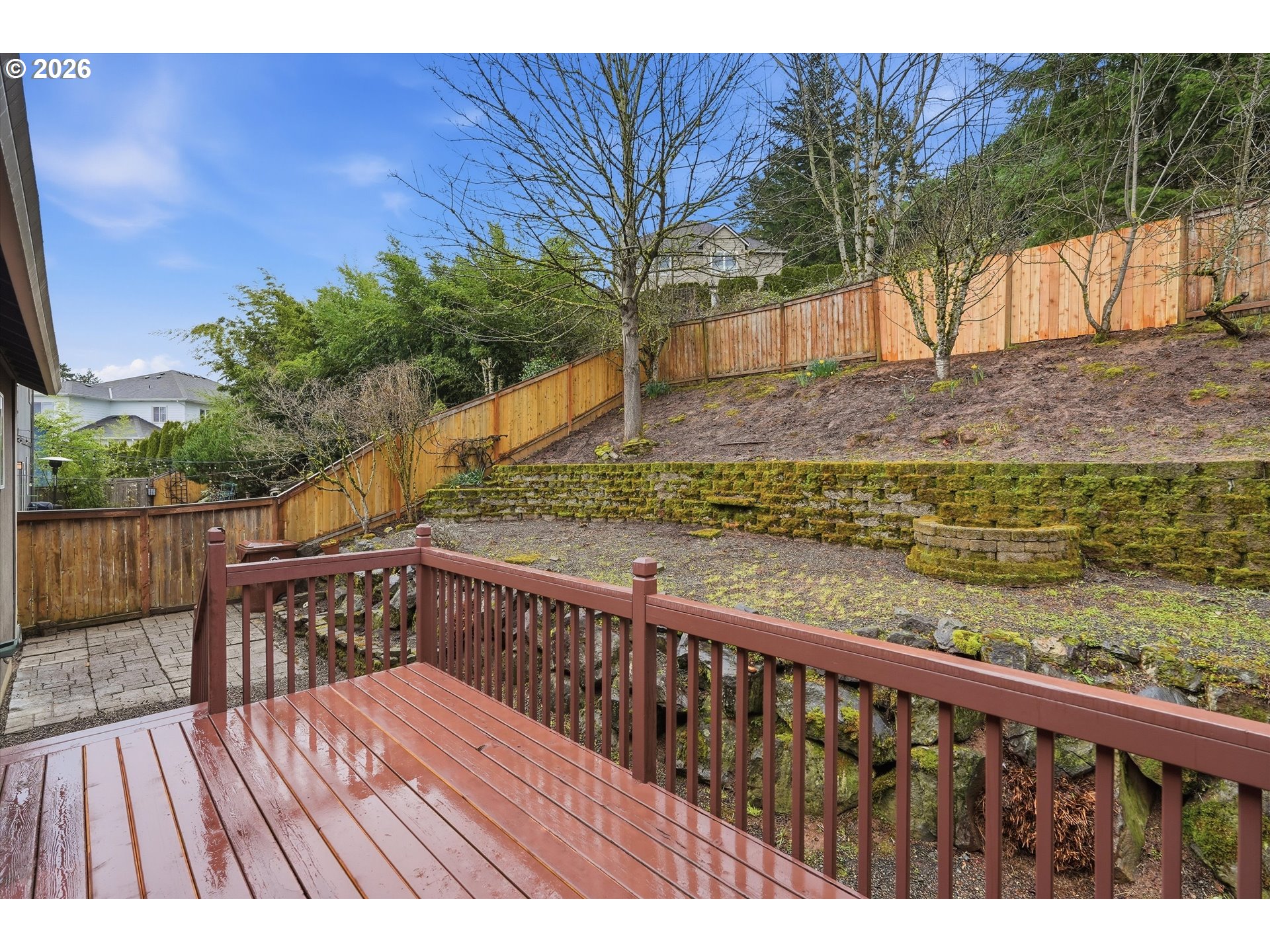 3130 Northwest Pacific Rim Drive Camas, WA 98607 - Photo 26 of 33 a view of deck with wooden floor and fence next to a yard
