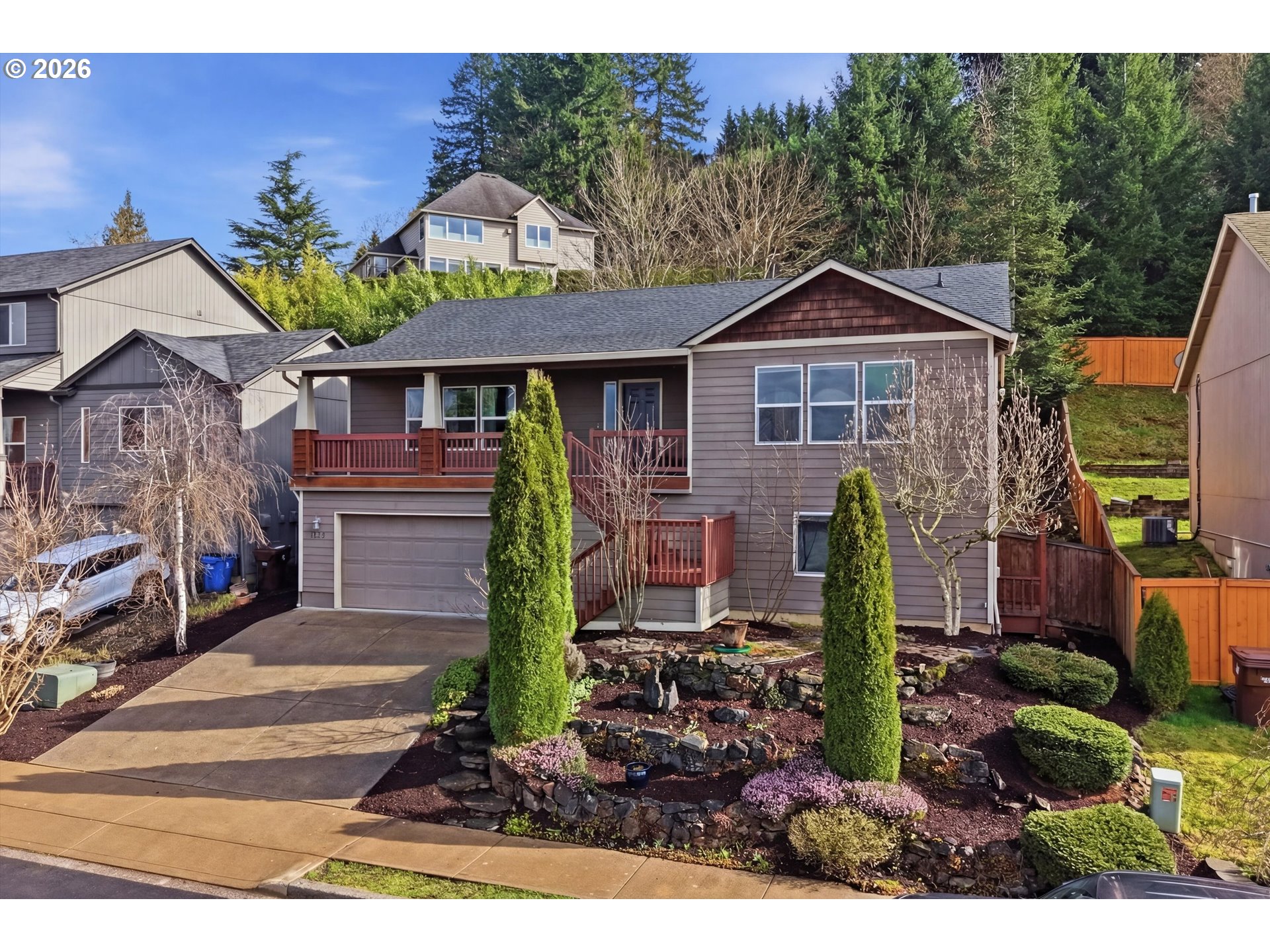 3130 Northwest Pacific Rim Drive Camas, WA 98607 - Photo 29 of 33 a front view of a house with garden