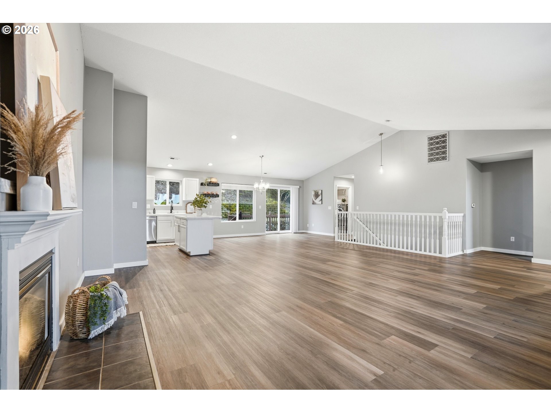 3130 Northwest Pacific Rim Drive Camas, WA 98607 - Photo 6 of 33 a living room with furniture and a wooden floor