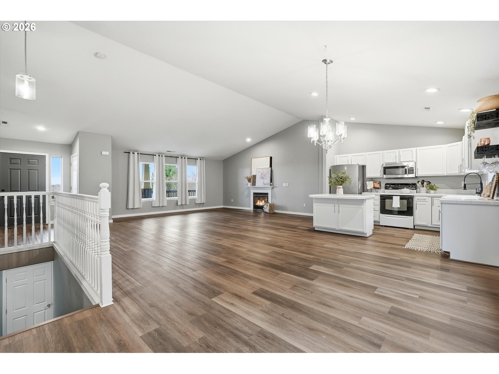3130 Northwest Pacific Rim Drive Camas, WA 98607 - Photo 8 of 33 a view of kitchen with furniture and wooden floor