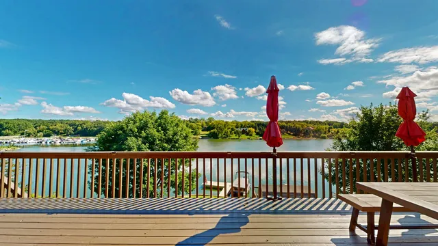 a view of a porch and a yard