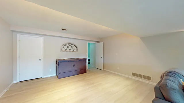 a view of a livingroom with wooden floor