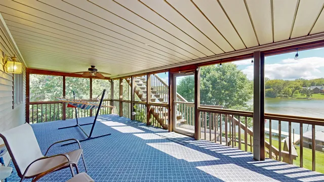a view of a porch with furniture