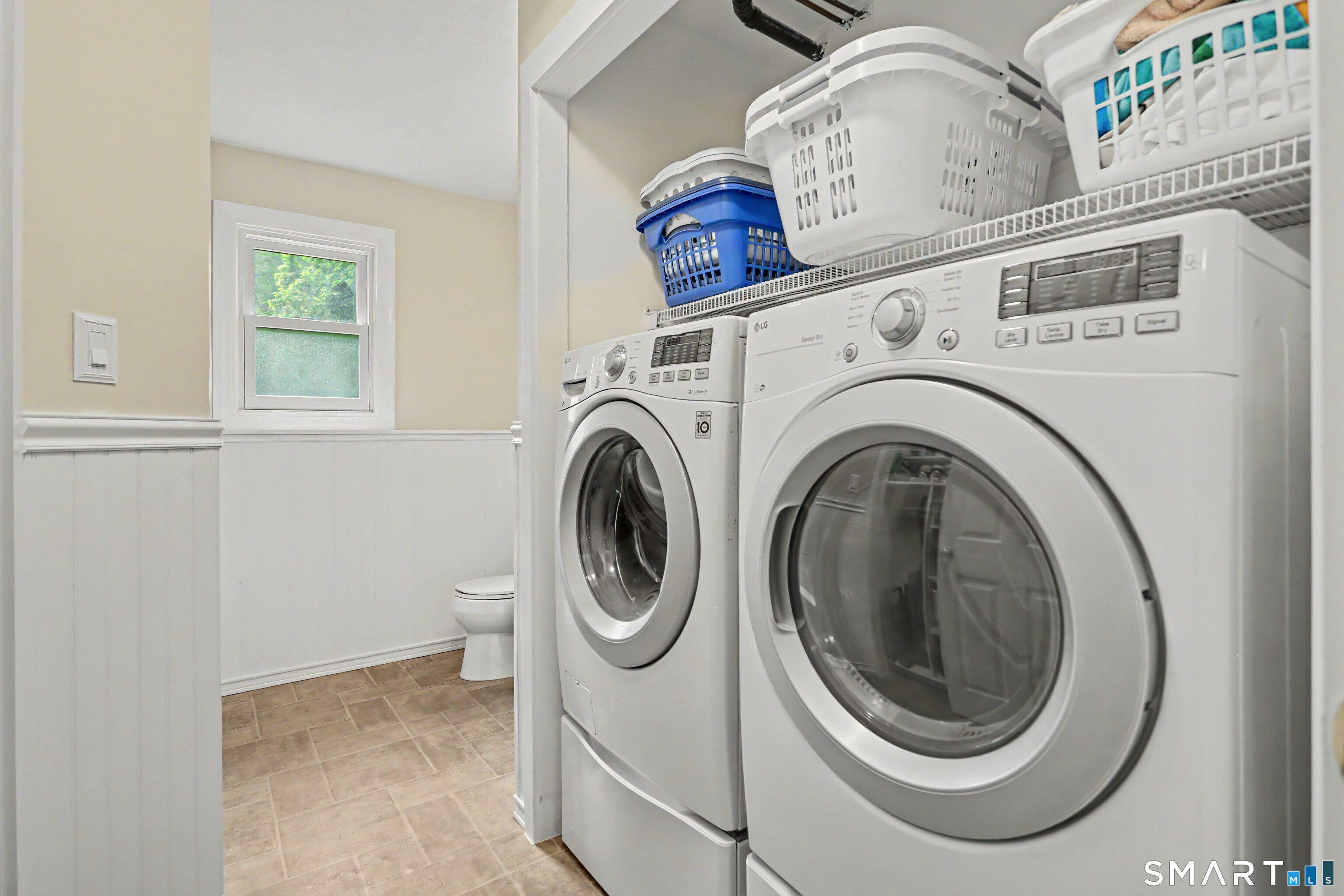 632 Wheelers Farm Road Orange, CT 06477 - Photo 29 of 39 a close up view of a washer and dryer