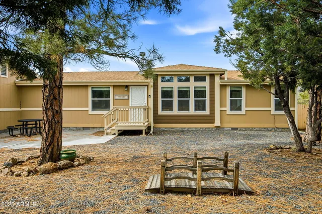 a backyard of a house with seating space