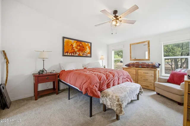 a kitchen that has a lot of cabinets in it