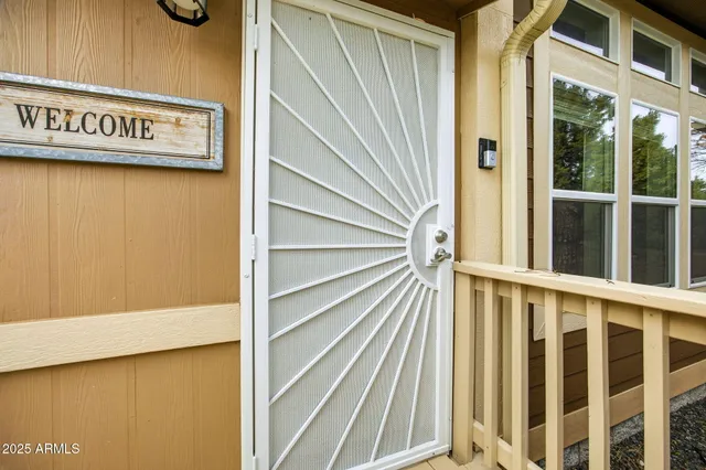 a view of a house with a outdoor space and street view