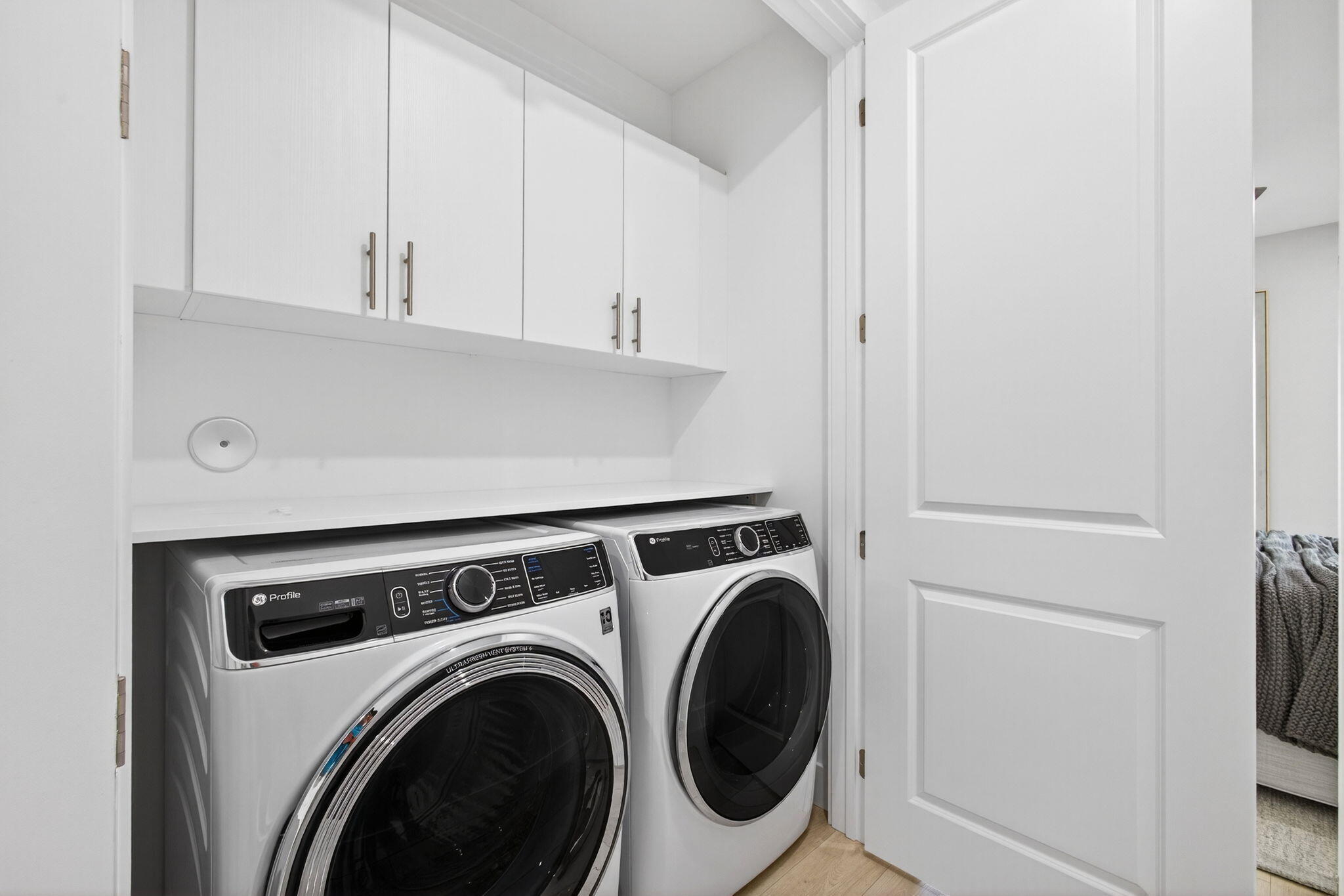 135 Water Pointe Place, Unit 22 Jupiter, FL 33477 - Photo 5 of 15 Inside Laundry Upper
