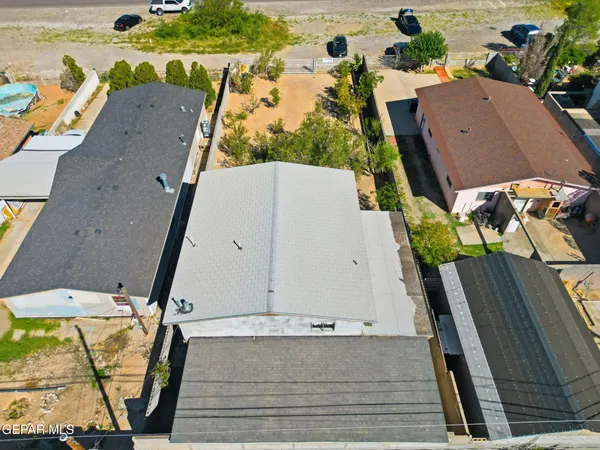 a kitchen with stainless steel appliances a stove a refrigerator and a refrigerator