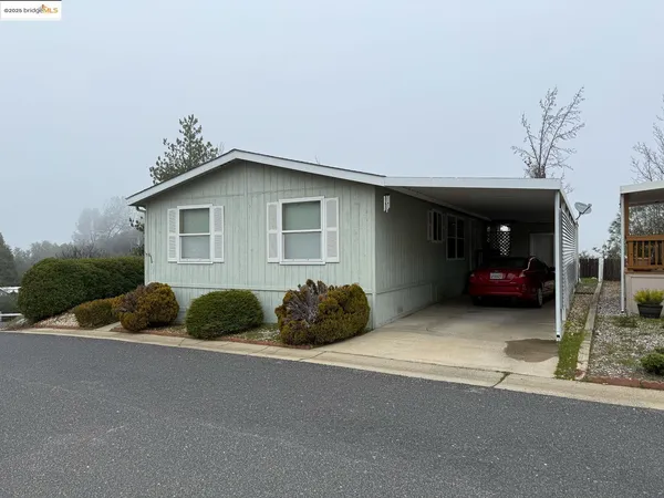 a house view with a outdoor space