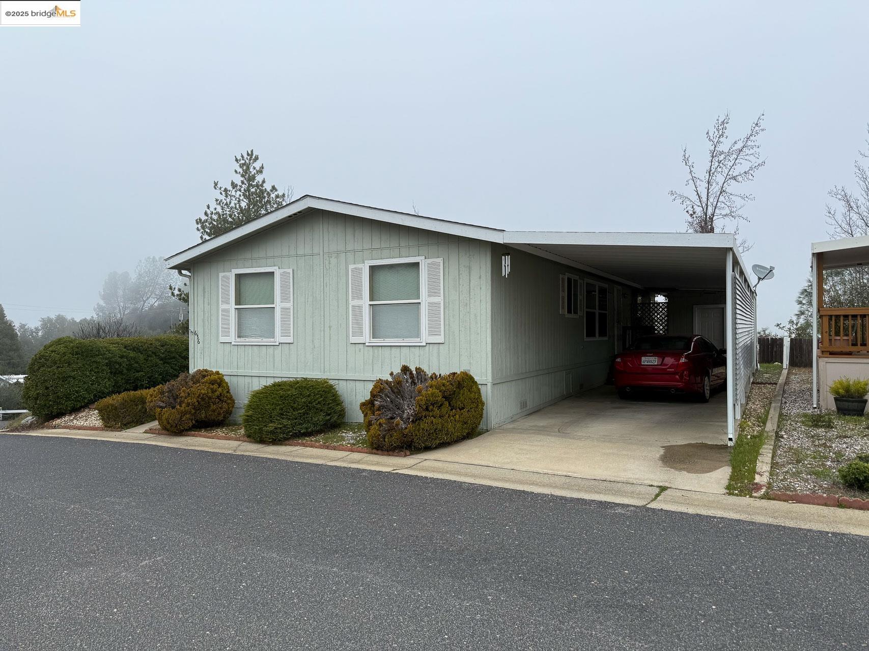 a house view with a outdoor space