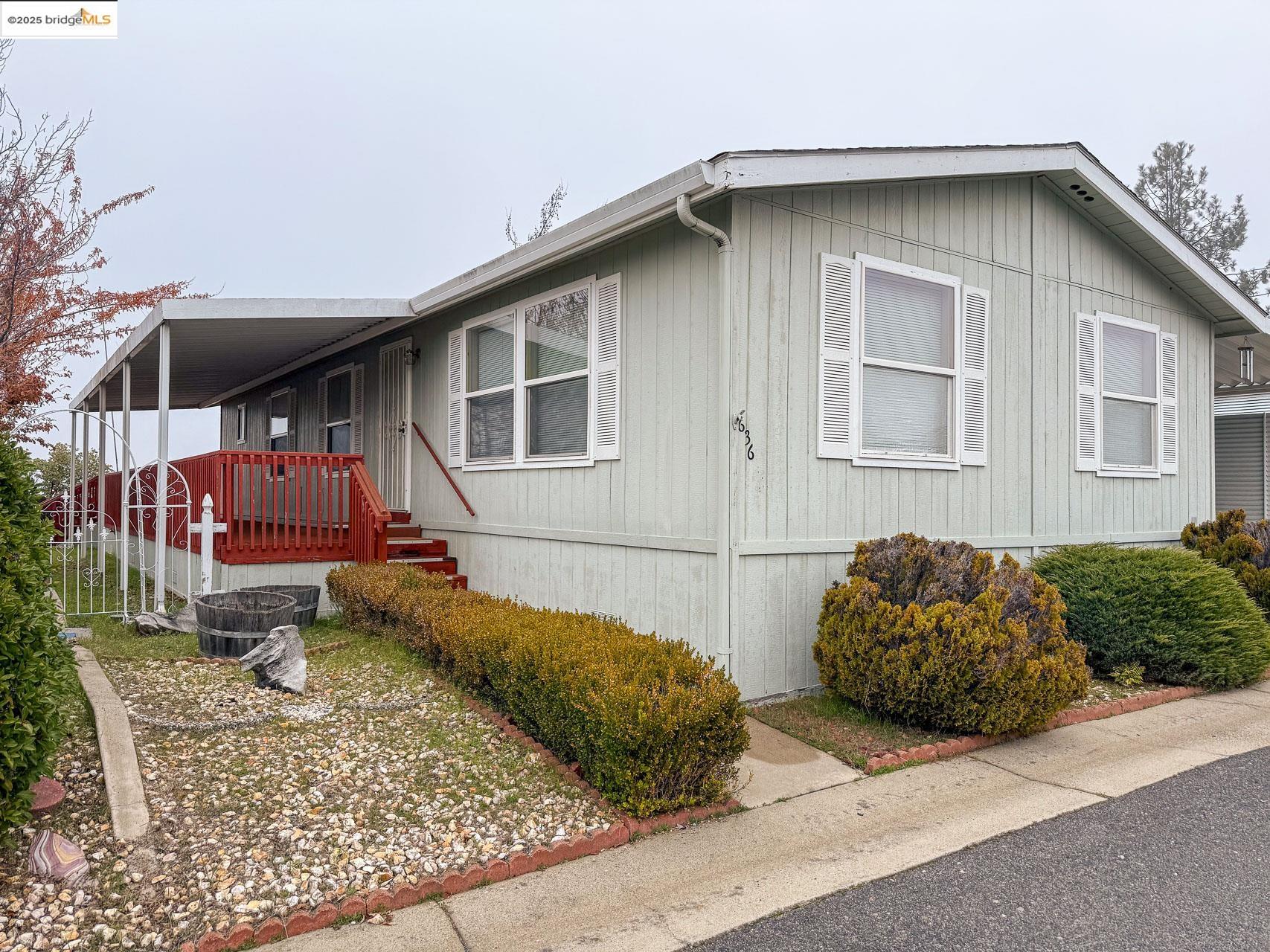 18717 Mill Villa Road, Unit 636 Jamestown, CA 95327 - Photo 2 of 24 a house view with a outdoor space