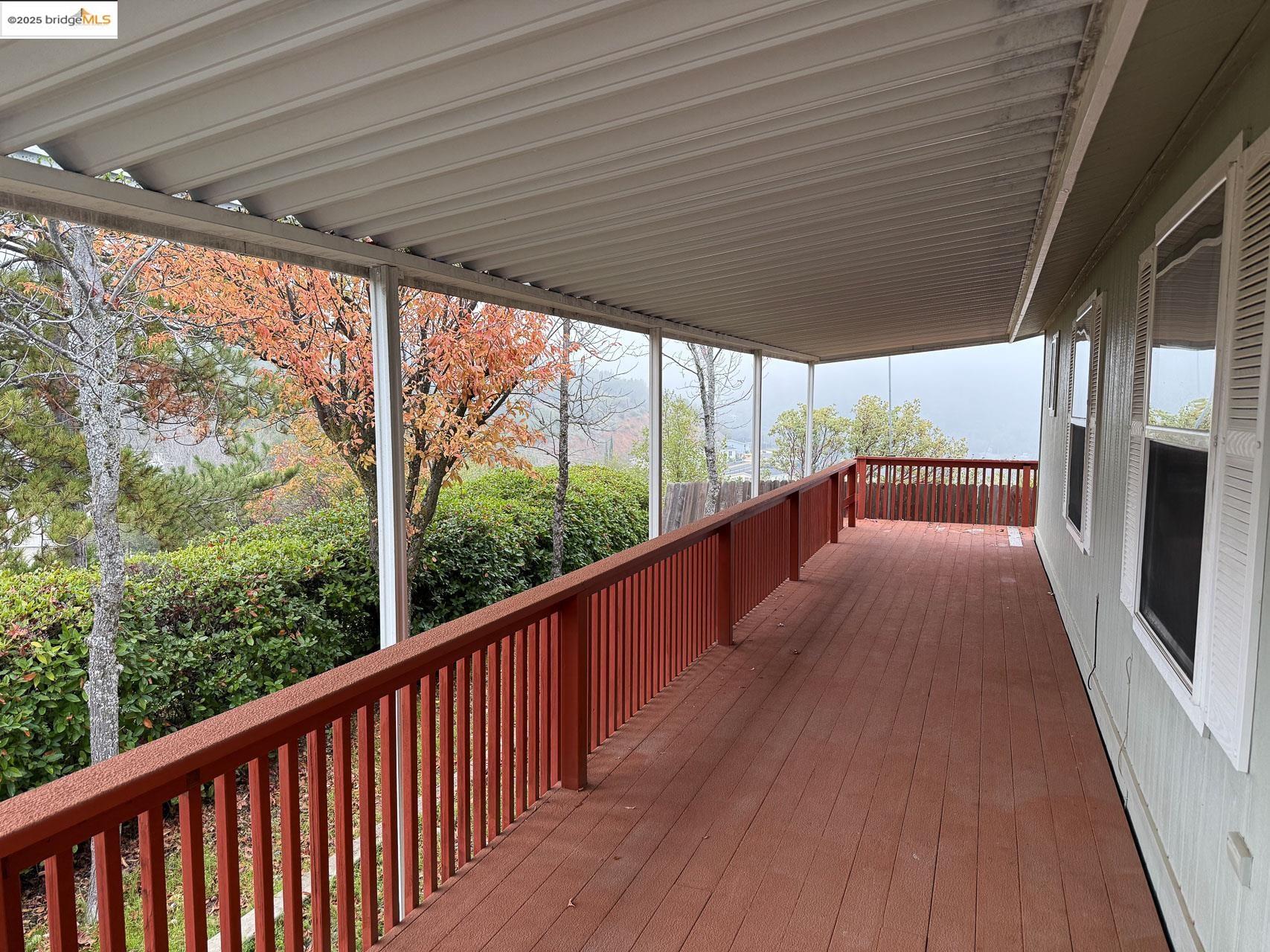 18717 Mill Villa Road, Unit 636 Jamestown, CA 95327 - Photo 3 of 24 a view of balcony with wooden floor