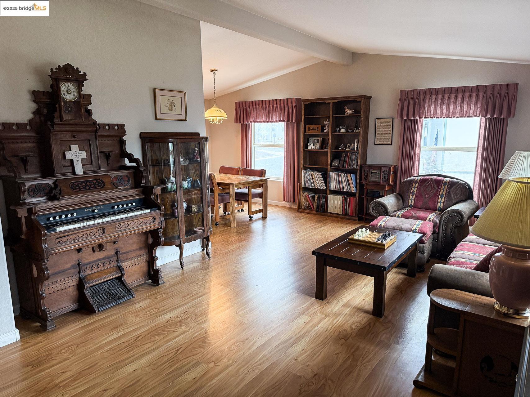 18717 Mill Villa Road, Unit 636 Jamestown, CA 95327 - Photo 5 of 24 a living room with furniture and wooden floor