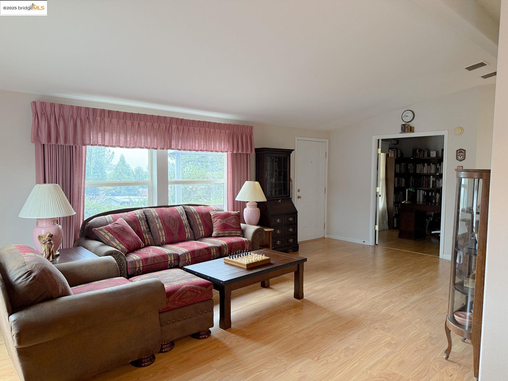 18717 Mill Villa Road, Unit 636 Jamestown, CA 95327 - Photo 7 of 24 a living room with furniture and a window