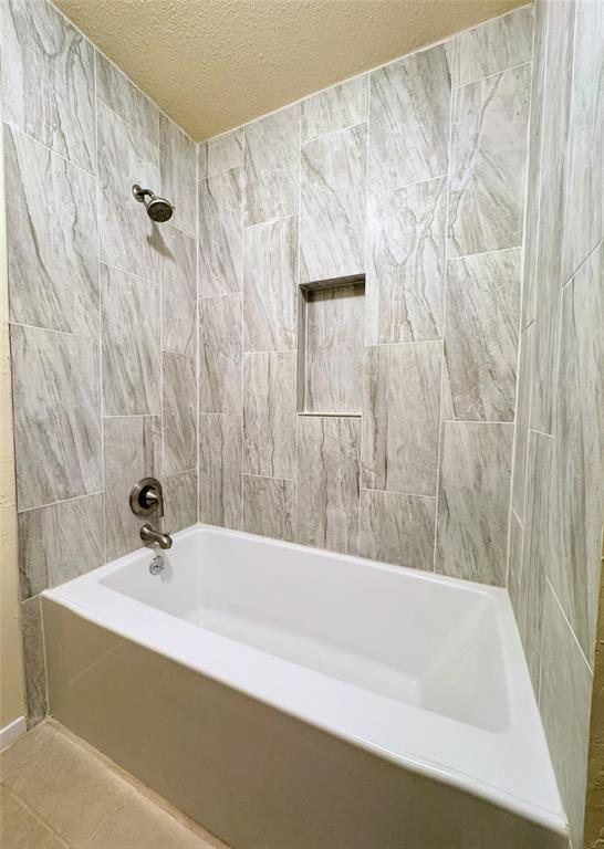 a bathroom with a bathtub