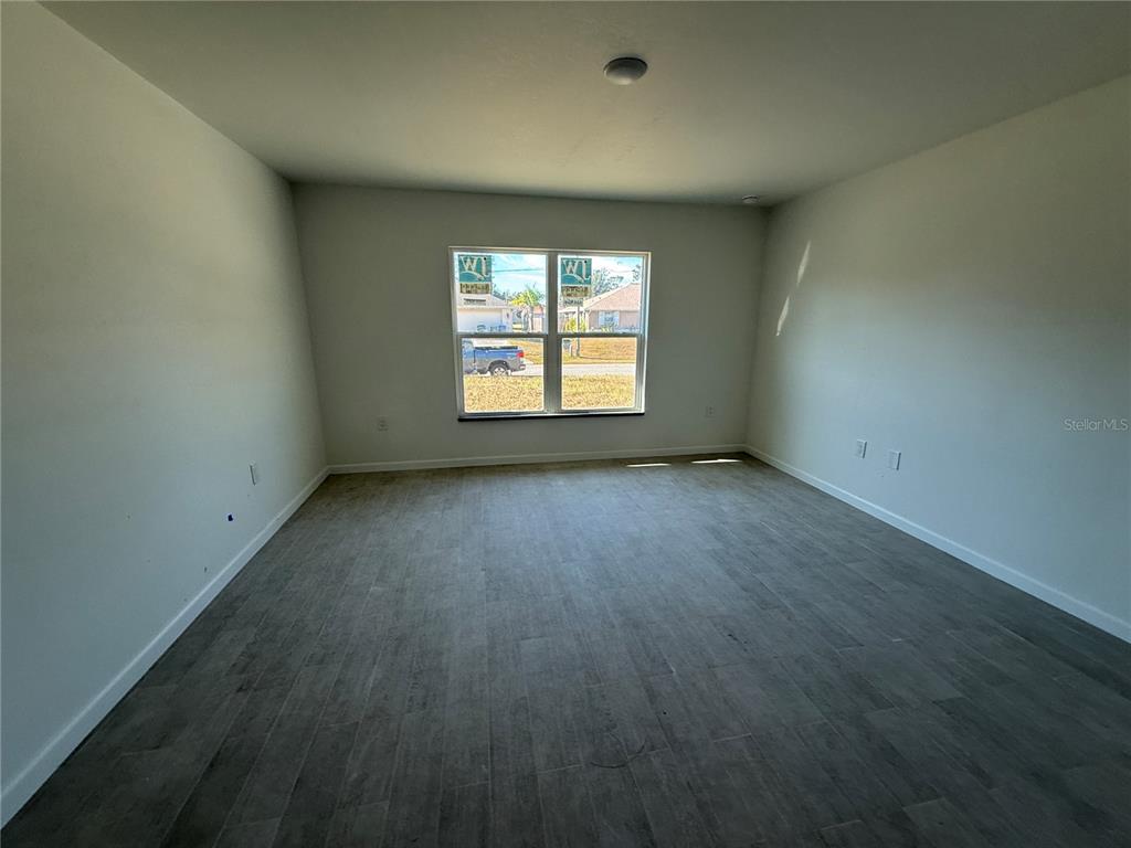 2164 Northland Avenue North Port, FL 34288 - Photo 12 of 31 an empty room with a window