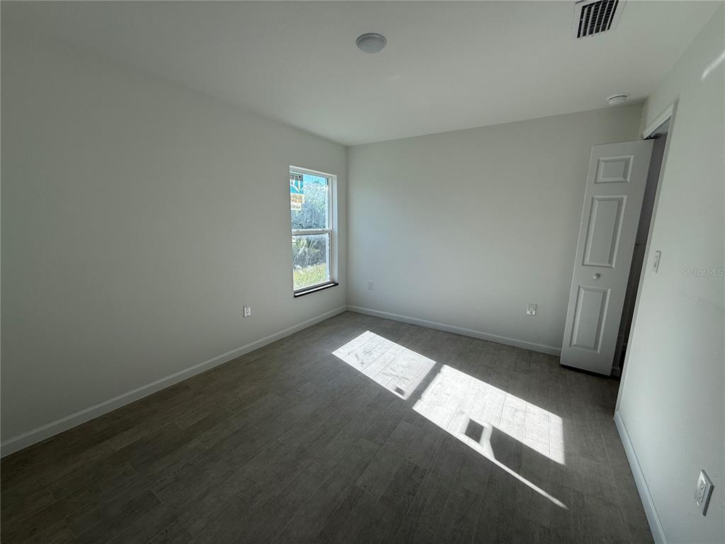 2164 Northland Avenue North Port, FL 34288 - Photo 13 of 31 an empty room with windows