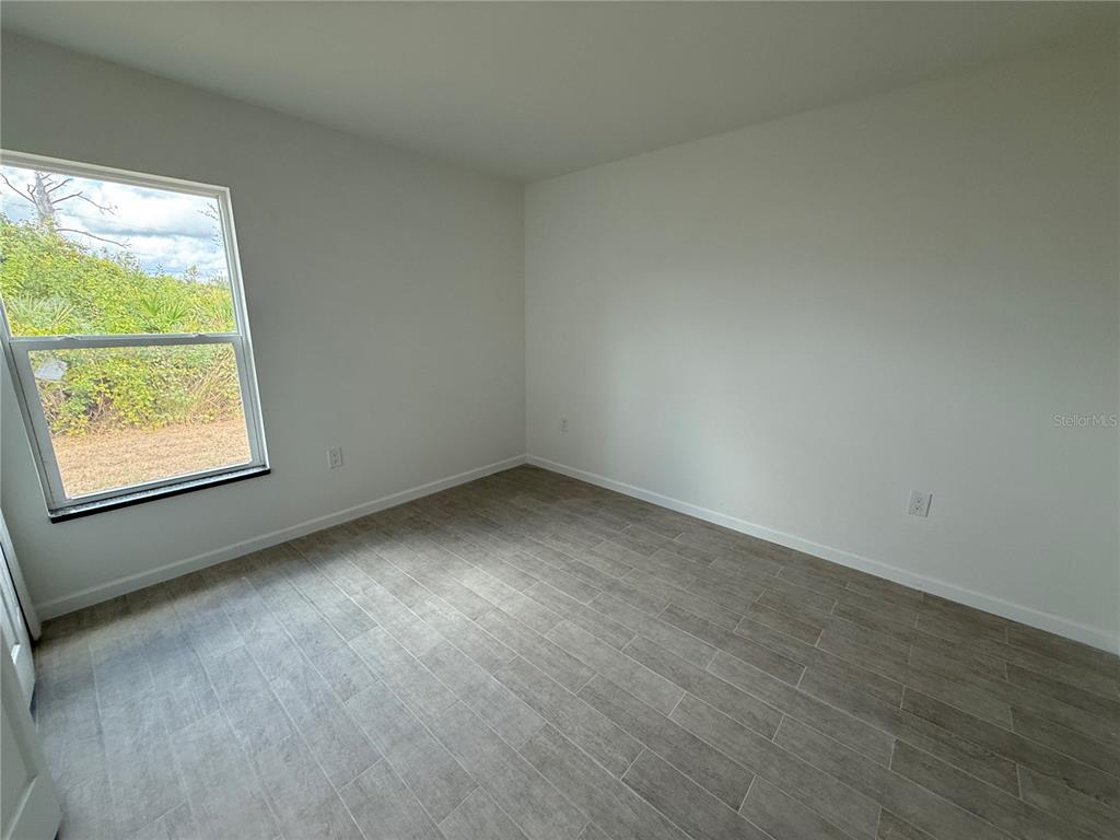 2164 Northland Avenue North Port, FL 34288 - Photo 24 of 31 an empty room with a window