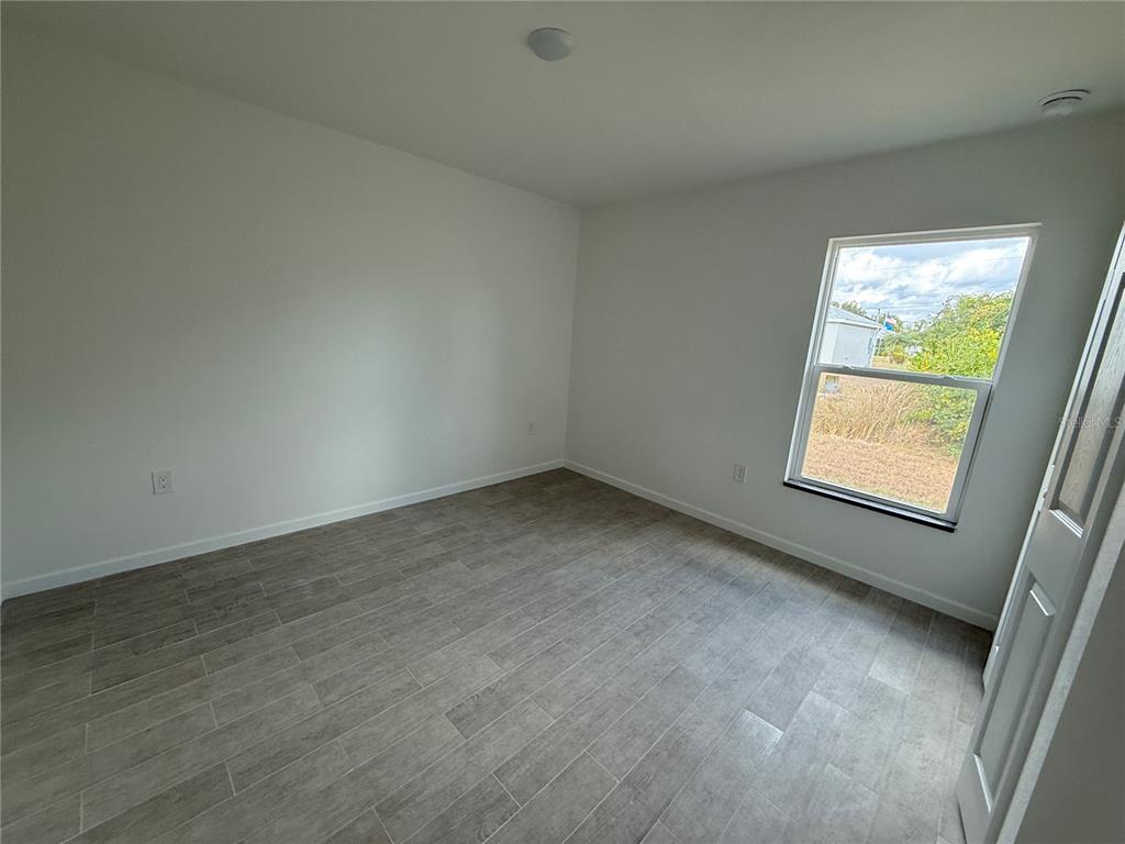 2164 Northland Avenue North Port, FL 34288 - Photo 25 of 31 an empty room with a window