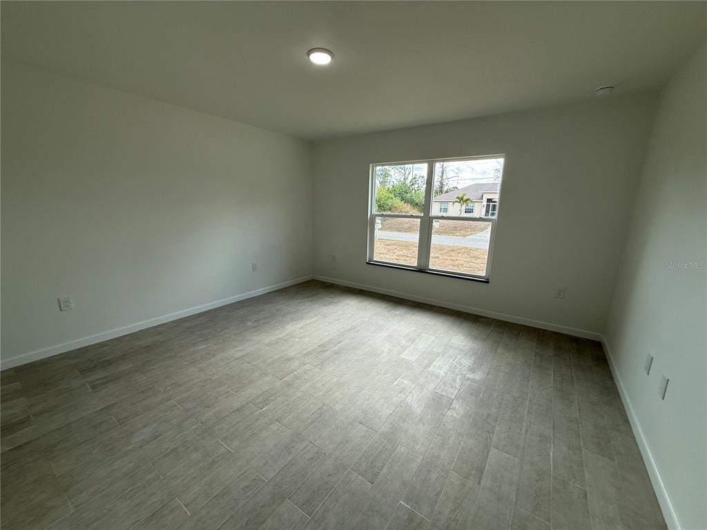 2164 Northland Avenue North Port, FL 34288 - Photo 26 of 31 an empty room with a window
