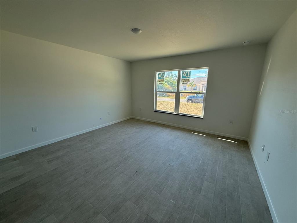 2164 Northland Avenue North Port, FL 34288 - Photo 9 of 31 an empty room with a window