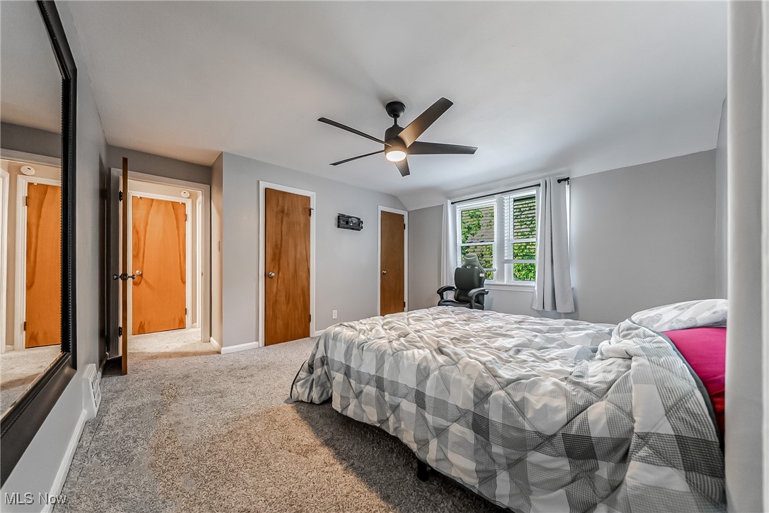 1235 Dorsh Road Cleveland, OH 44121 - Photo 17 of 39 Bedroom featuring carpet floors and a ceiling fan