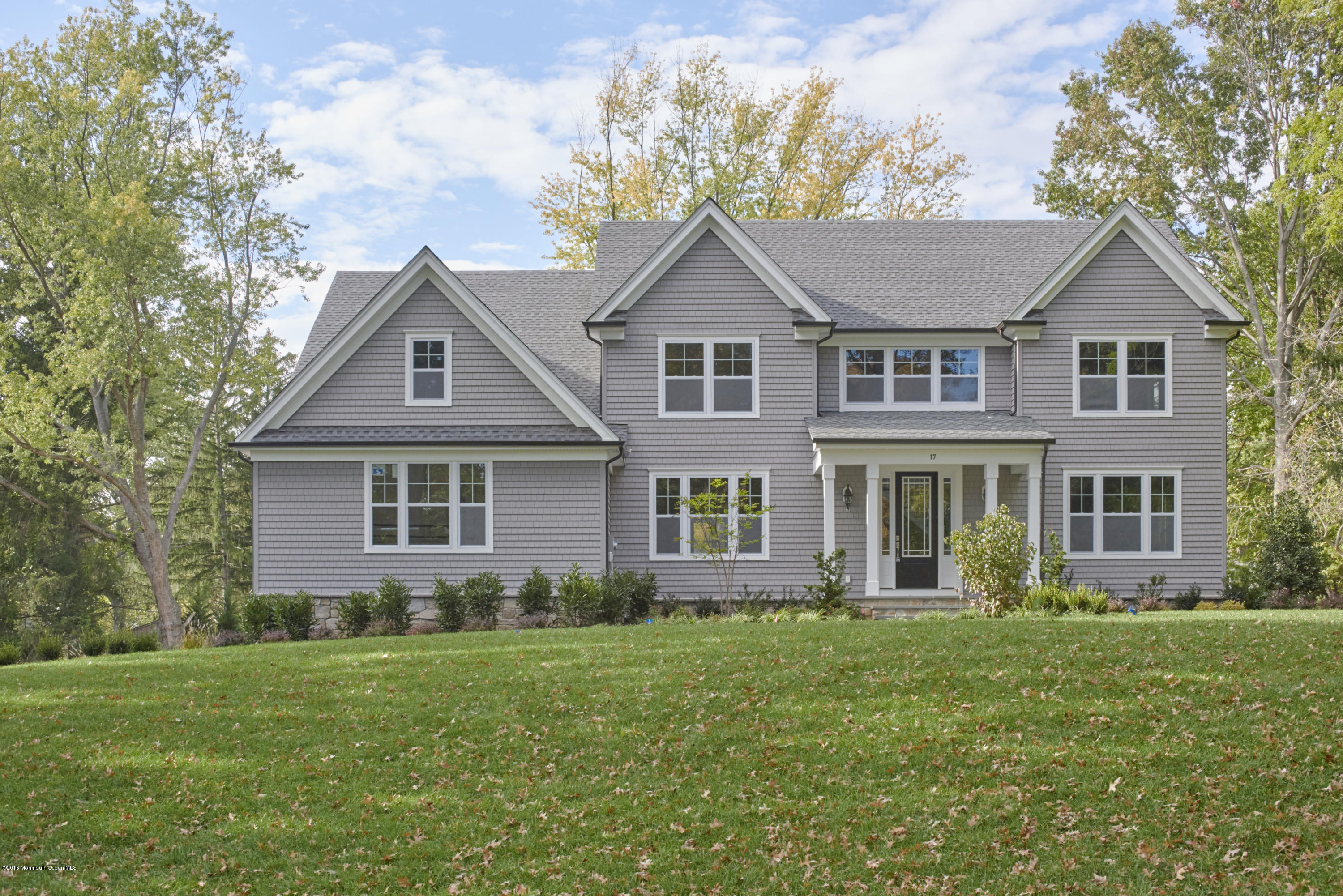 17 Cardinal Road Middletown, NJ 07748 - Photo 1 of 22 front view of a house with a yard