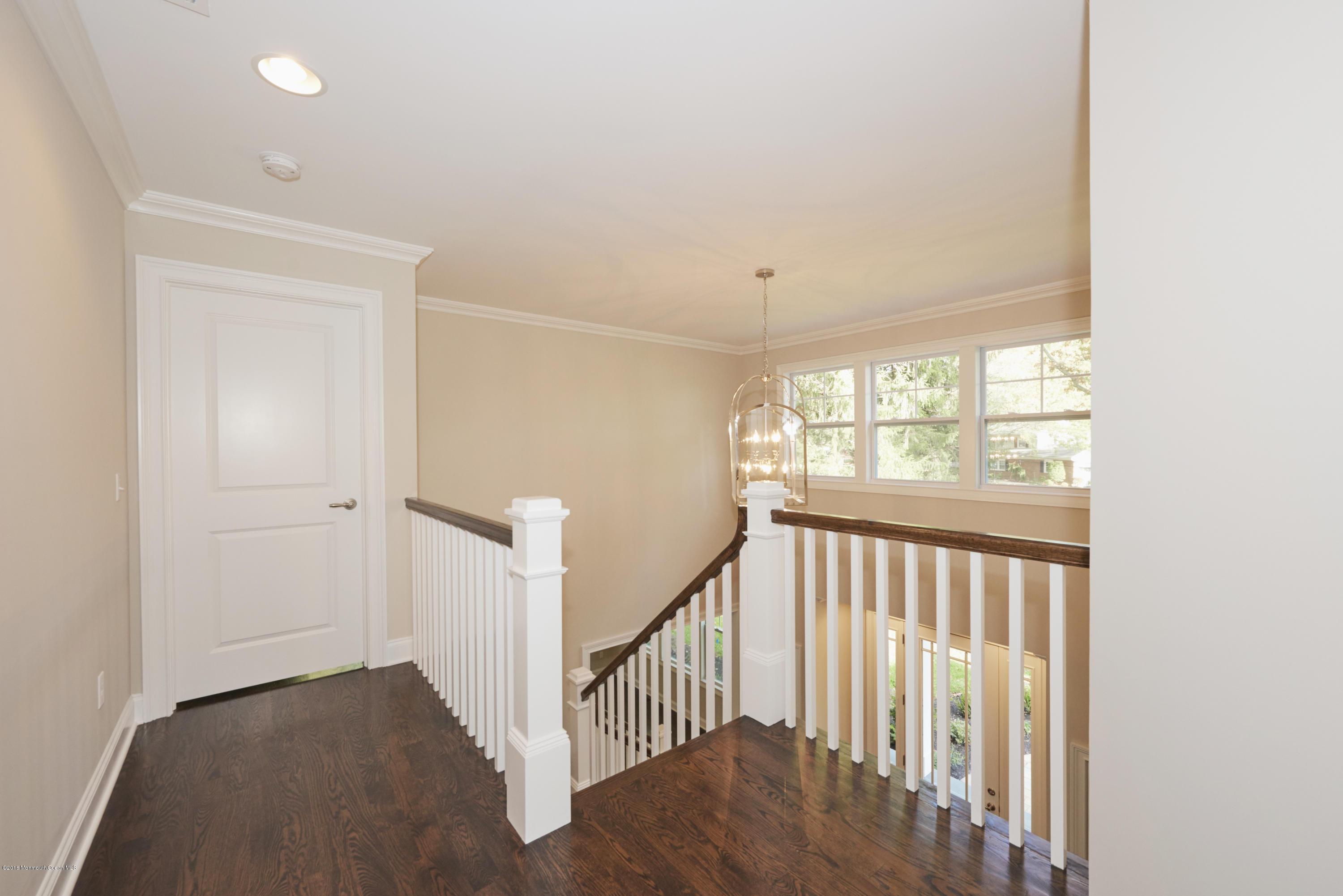 17 Cardinal Road Middletown, NJ 07748 - Photo 13 of 22 a view of a hallway with windows