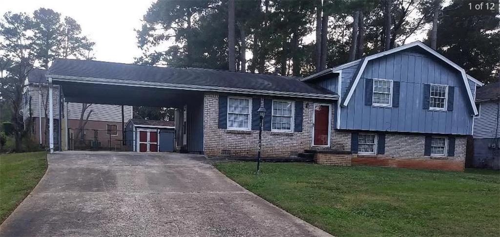 6041 Randy Lane Ellenwood, GA 30294 - Photo 1 of 1 a front view of a house with a yard