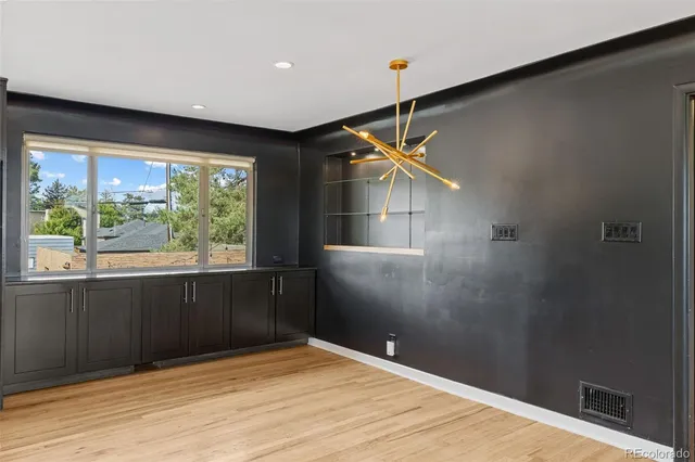 a empty room with windows