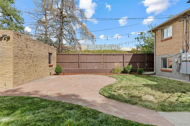 a backyard of a house with lots of green space