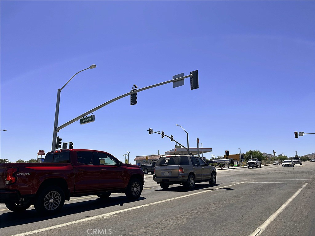 10738 Sheep Creek Road Phelan, CA 92371 - Photo 17 of 20 a car parked on the side of a street