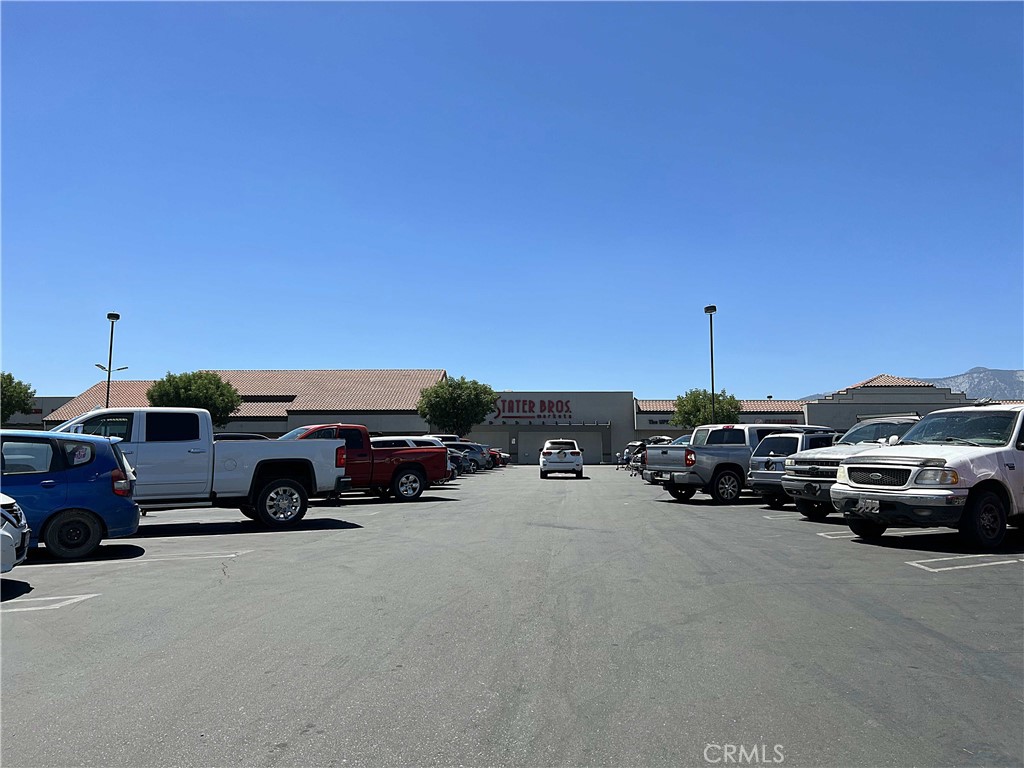 10738 Sheep Creek Road Phelan, CA 92371 - Photo 18 of 20 a view of a cars parked in a parking lot