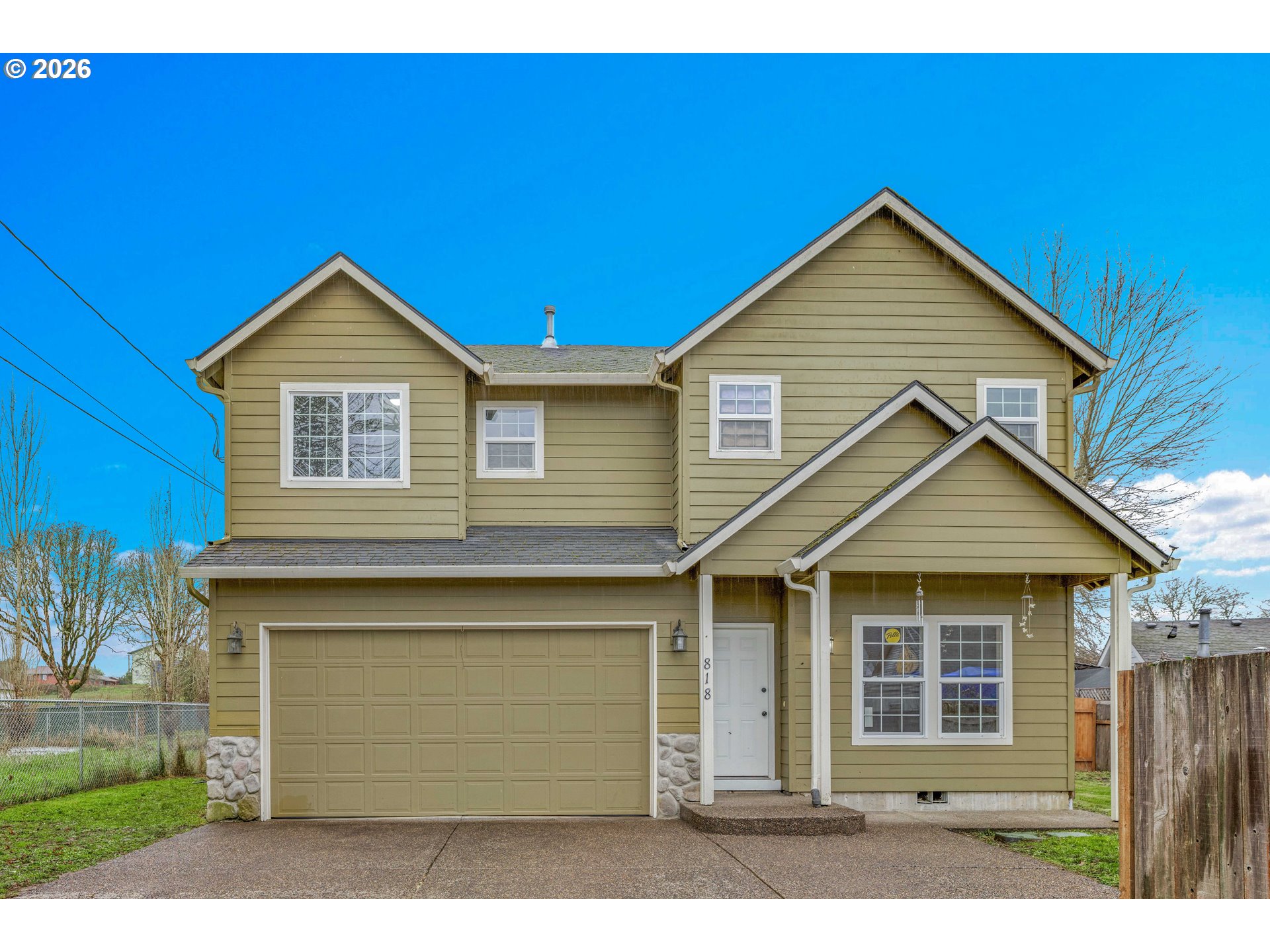 818 South Bridge Street Sheridan, OR 97378 - Photo 1 of 1 a front view of a house with a yard