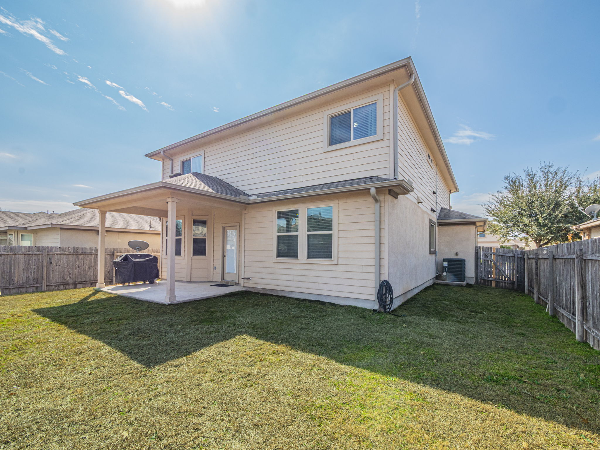 1366 Heep Run Buda, TX 78610 - Photo 28 of 37 Back of house featuring a patio area and a fenced backyard